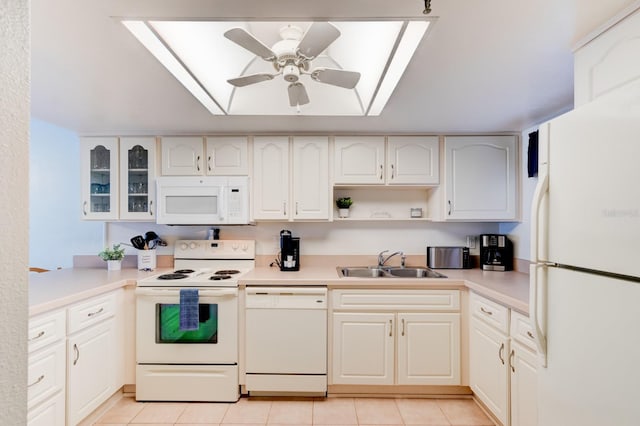 kitchen featuring ceiling fan, white cabinetry, light tile patterned floors, sink, and white appliances