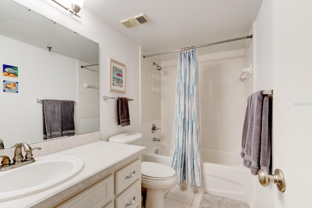 full bathroom featuring tile patterned floors, vanity, shower / tub combo with curtain, and toilet