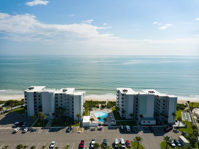 aerial view featuring a beach view and a water view