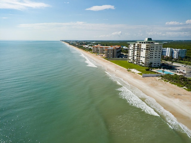 aerial view featuring a beach view and a water view