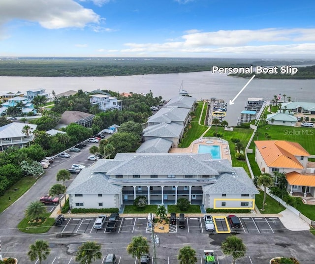 bird's eye view with a water view