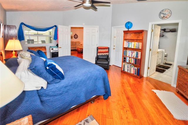 tiled bedroom featuring ceiling fan and ensuite bathroom