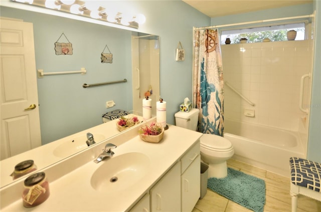 full bathroom with tile patterned floors, vanity, shower / tub combo with curtain, and toilet