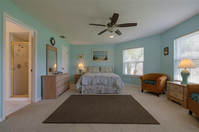 bedroom featuring a ceiling fan, baseboards, visible vents, and carpet flooring