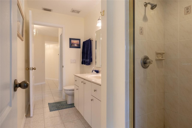 full bathroom featuring a stall shower, visible vents, toilet, and tile patterned floors