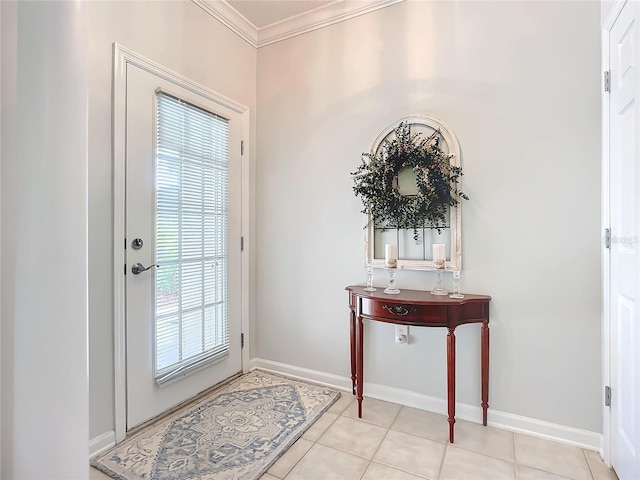 doorway with light tile patterned floors, baseboards, and ornamental molding