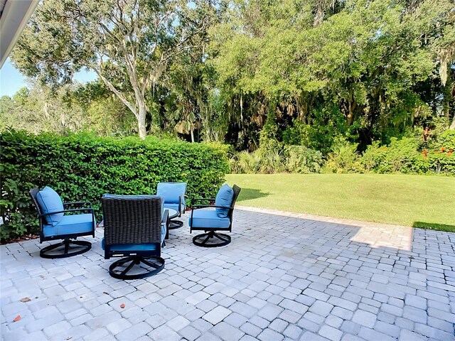 view of patio / terrace with an outdoor fire pit