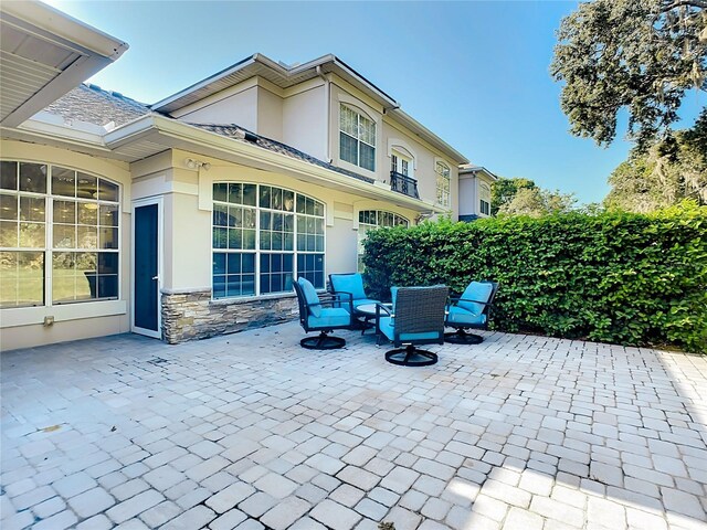 view of patio featuring an outdoor fire pit