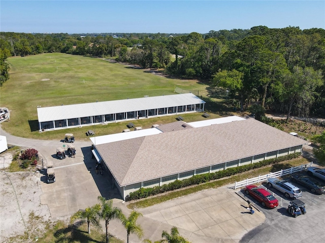 aerial view with a wooded view