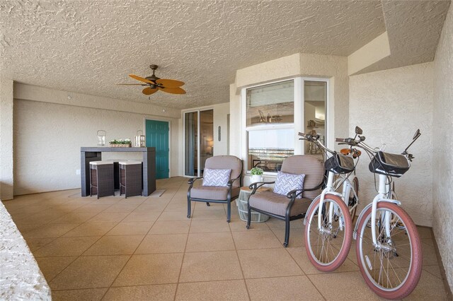 view of patio with a ceiling fan