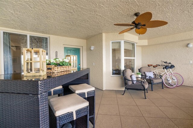 view of patio with ceiling fan