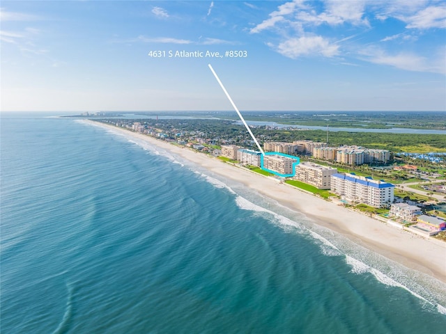 bird's eye view with a view of city, a beach view, and a water view