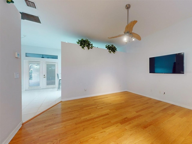 1780 Otisco Way, Winter Springs, FL 32708 - empty room with light wood finished floors, a ceiling fan, and baseboards