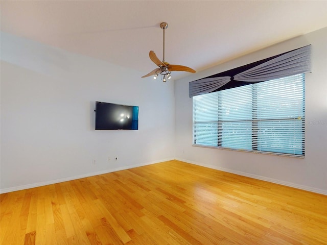 interior space featuring ceiling fan and wood-type flooring