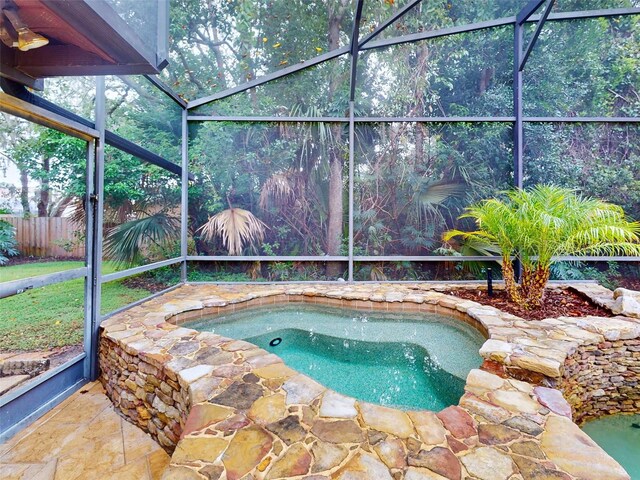 1780 Otisco Way, Winter Springs, FL 32708 - view of swimming pool with an in-ground hot tub and glass enclosure