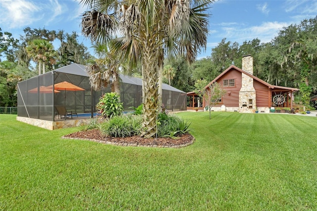 view of yard featuring glass enclosure