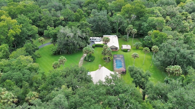 drone / aerial view with a view of trees