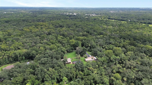 bird's eye view featuring a forest view