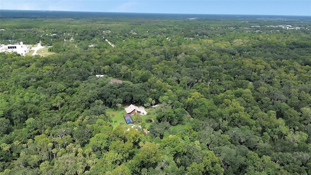 aerial view featuring a forest view