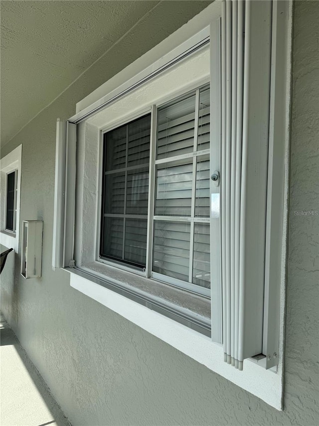 details featuring stucco siding