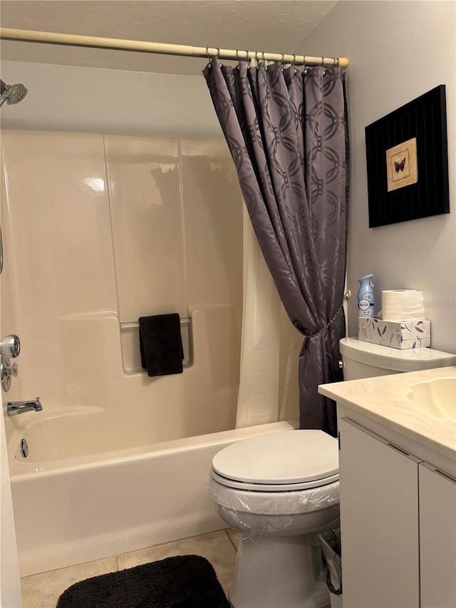 full bathroom with tile patterned flooring, shower / bath combination with curtain, toilet, and vanity