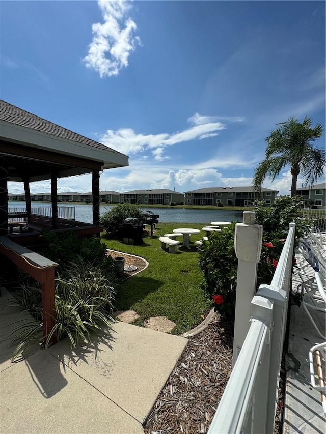 view of yard with a water view