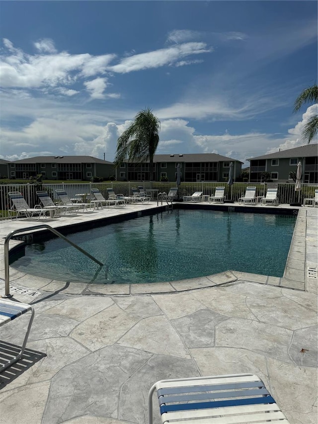 view of pool featuring a patio