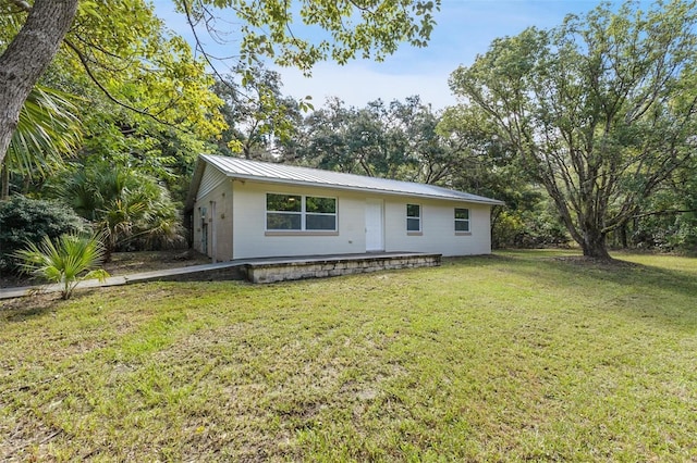 view of front of home with a front yard