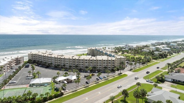 aerial view featuring a water view and a view of the beach