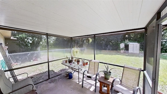 sunroom with wooden ceiling