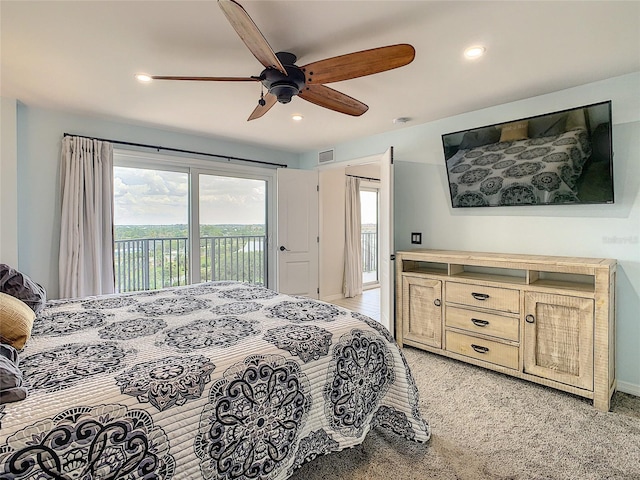 bedroom with light colored carpet, access to outside, and ceiling fan