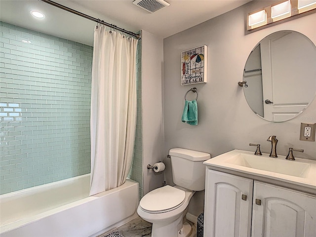 full bathroom featuring shower / bath combination with curtain, toilet, and vanity