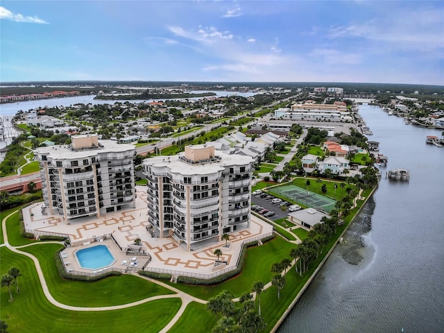 birds eye view of property with a water view