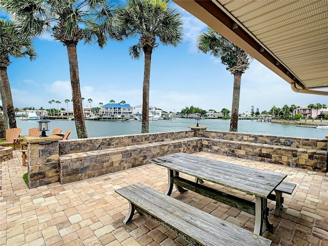 view of patio featuring a water view