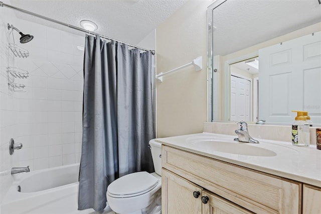 full bathroom featuring shower / bathtub combination with curtain, vanity, toilet, and a textured ceiling