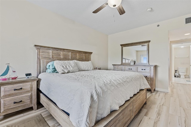 bedroom featuring ceiling fan and light hardwood / wood-style flooring