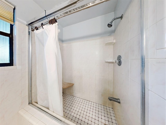 bathroom with a shower with shower curtain