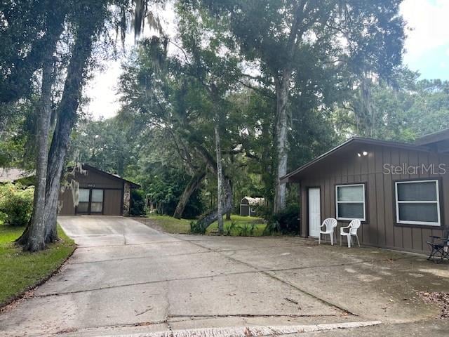 view of side of property featuring a garage