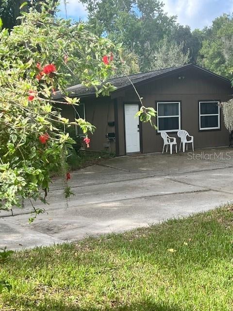 rear view of property with a patio