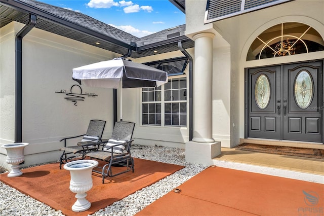 property entrance featuring covered porch