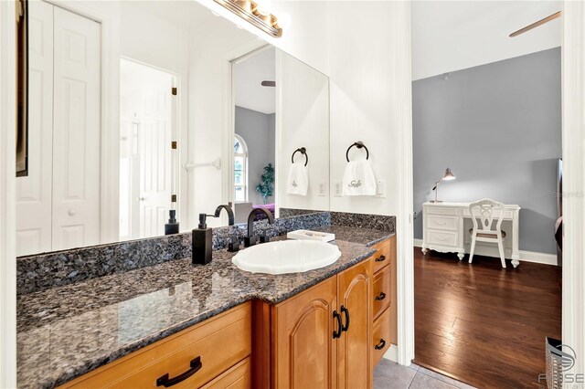 bathroom with wood-type flooring and vanity