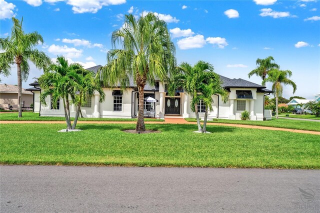 view of front facade with a front lawn