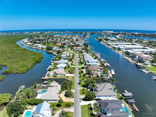 bird's eye view featuring a residential view and a water view
