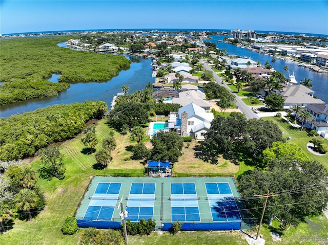 birds eye view of property featuring a water view