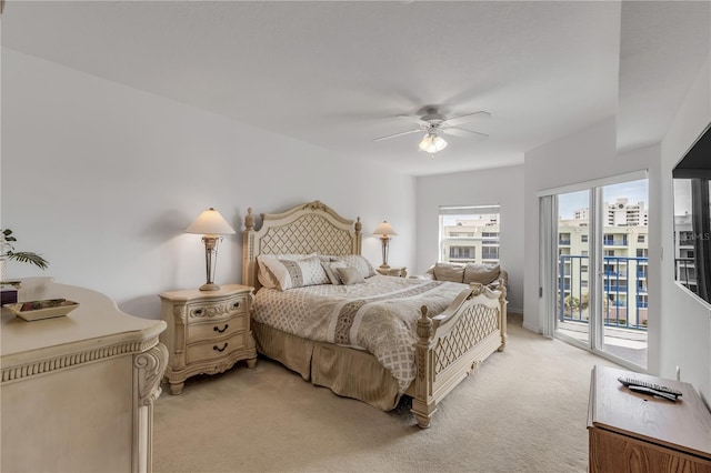 carpeted bedroom with access to exterior and ceiling fan