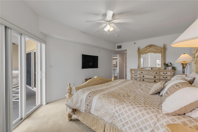 bedroom featuring ceiling fan, carpet, and access to outside