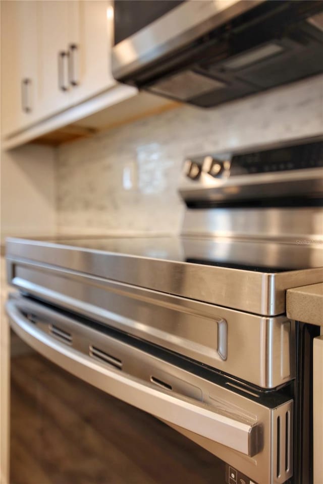 interior details featuring white cabinets