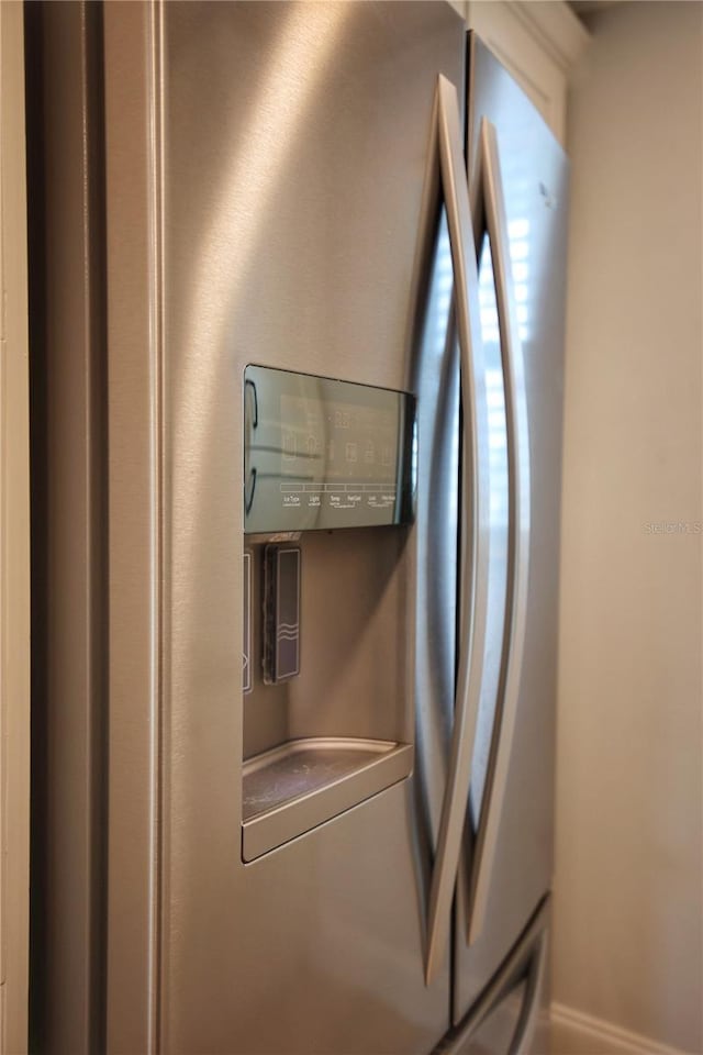 room details with stainless steel fridge