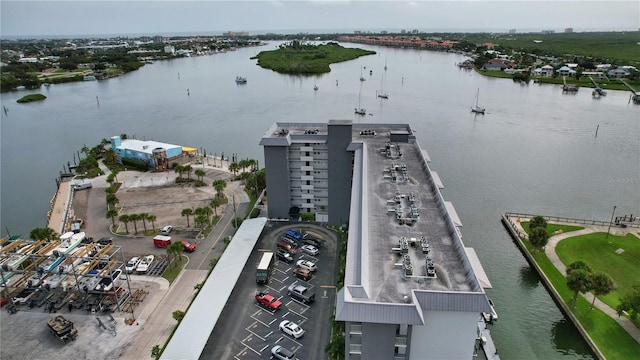 birds eye view of property featuring a water view