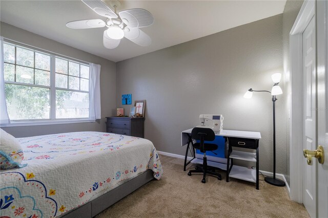 carpeted bedroom featuring ceiling fan